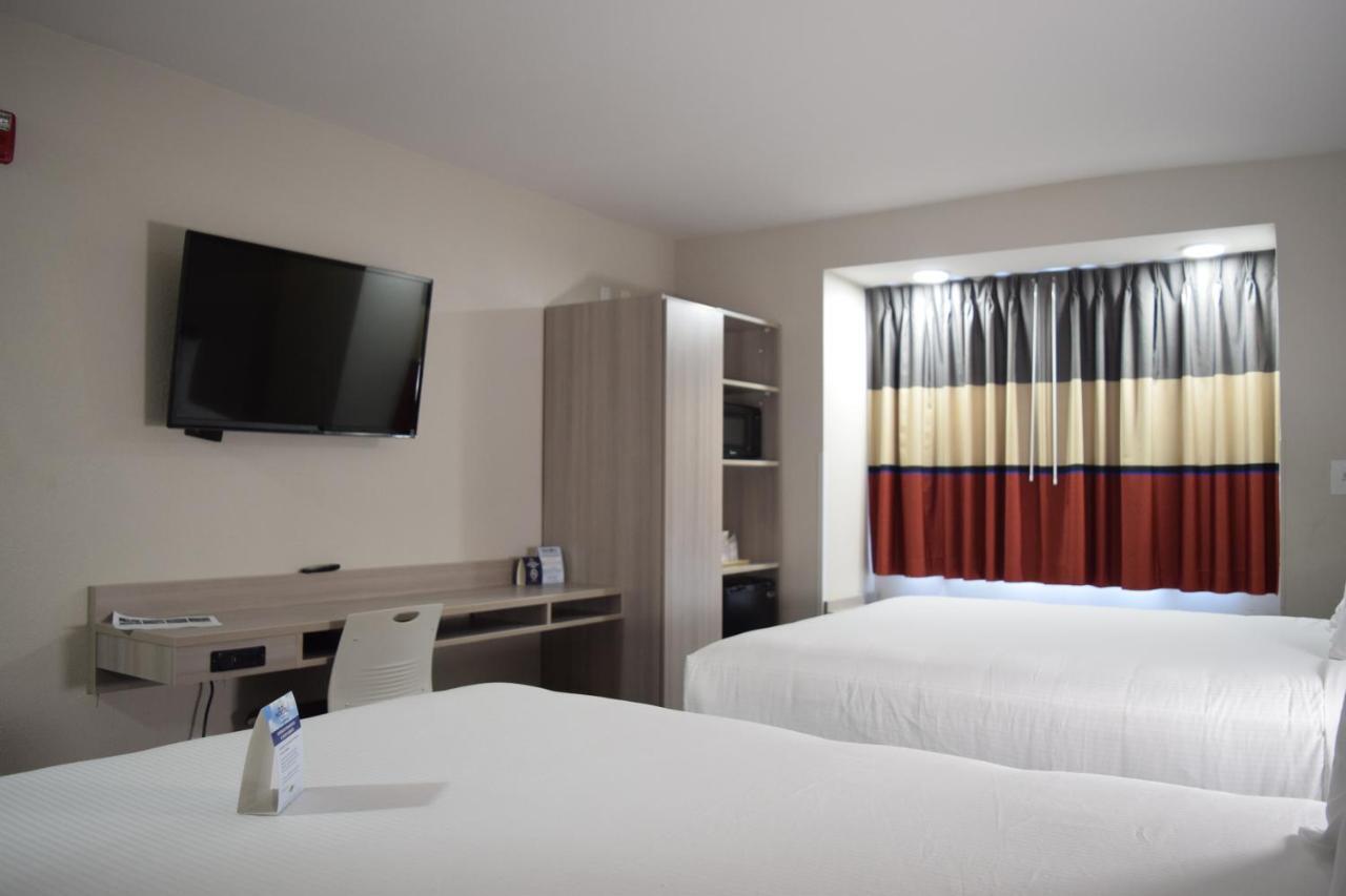 Travelers Inn And Suites ราลลี ภายนอก รูปภาพ